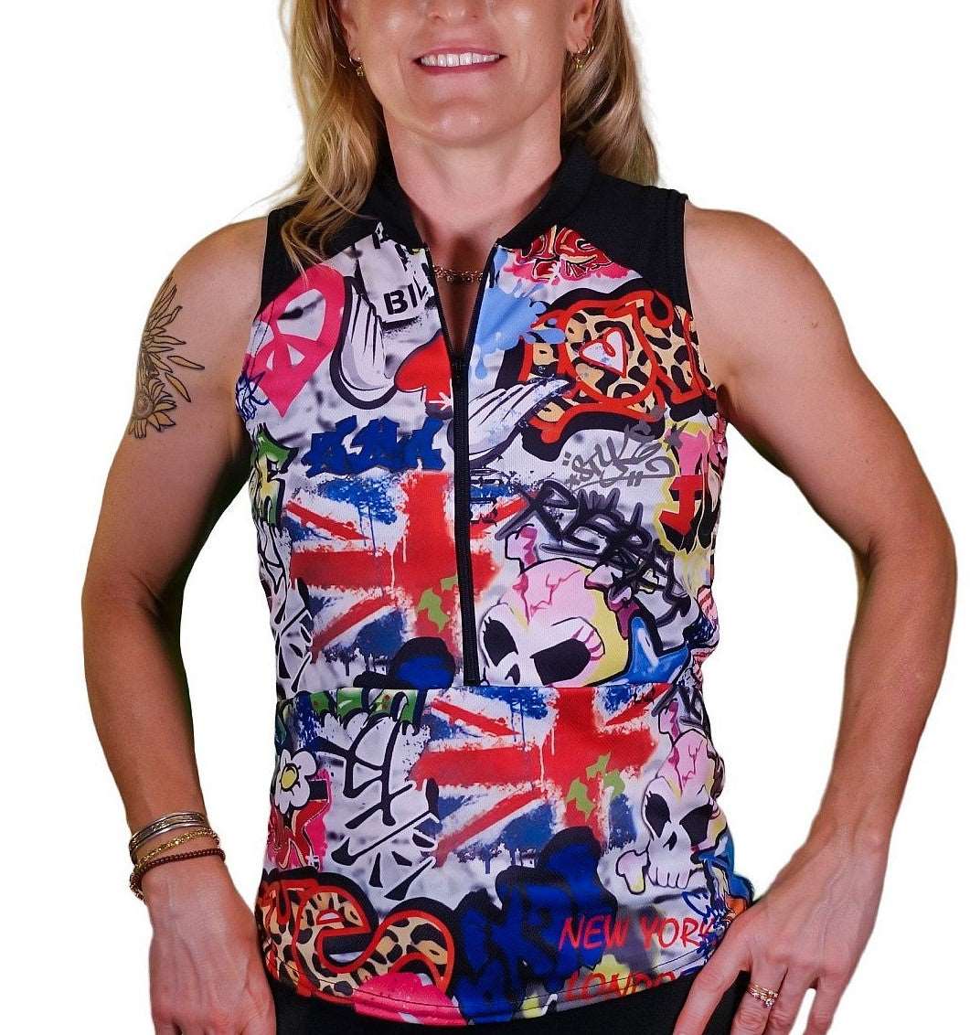 Graffiti print sleeveless top with zipper and vibrant street art design.